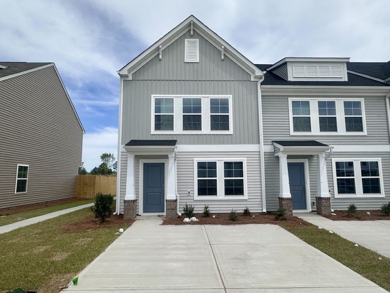 Front exterior of a new home in Astoria, Columbia, SC, highlighting curb appeal (Image 1). Front exterior of a new home in Astoria, Columbia, SC, highlighting curb appeal (Image 1).