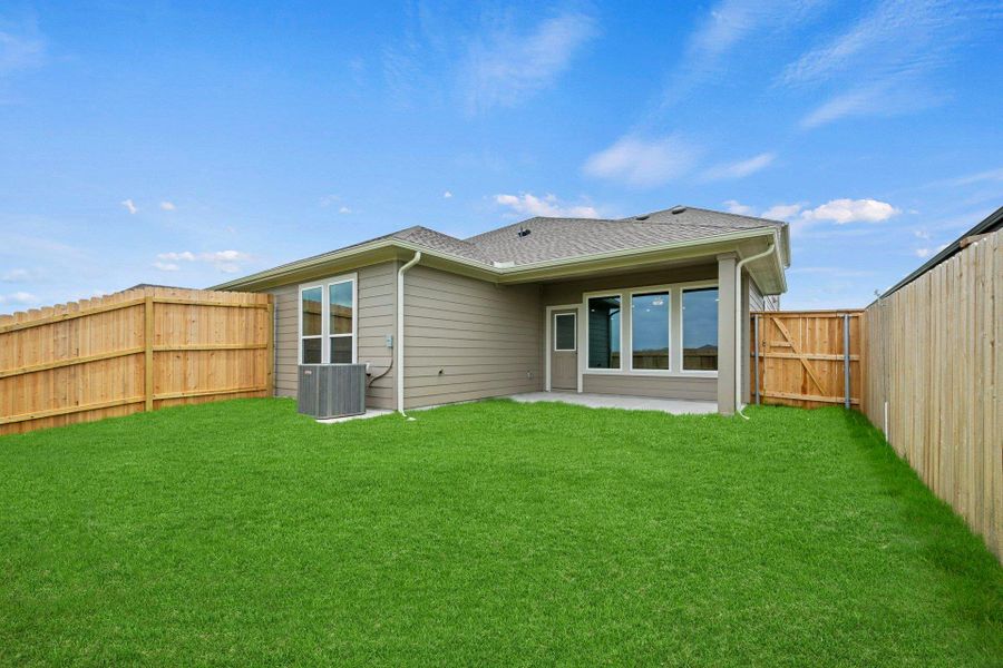Rear of Home and Private Backyard