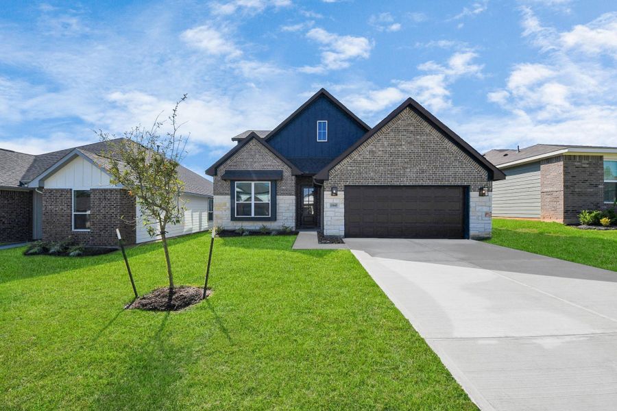 Front exterior of a new home in Lexington Heights, Willis, TX, highlighting curb appeal (Image 25).
