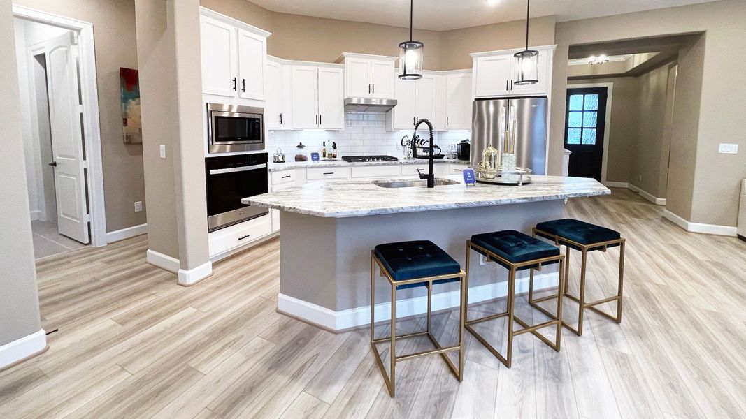 Representative furnished interior of a home built from the Portico by Epcon Communities in Winfrey Estates, Tomball (Image 7). Representative furnished interior of a home built from the Portico by Epcon Communities in Winfrey Estates, Tomball (Image 7).