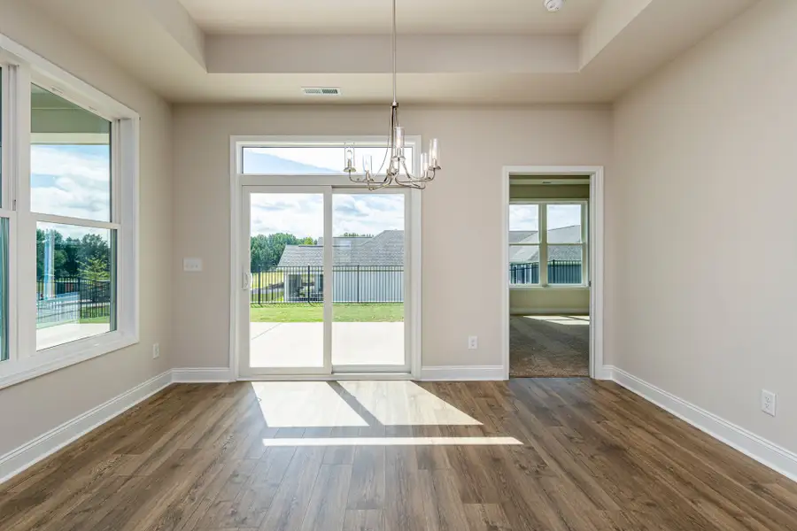 Representative unfurnished interior of a home built from the Salerno by McKee Homes in The Cottages at 78 North, Sanford (Image 8).