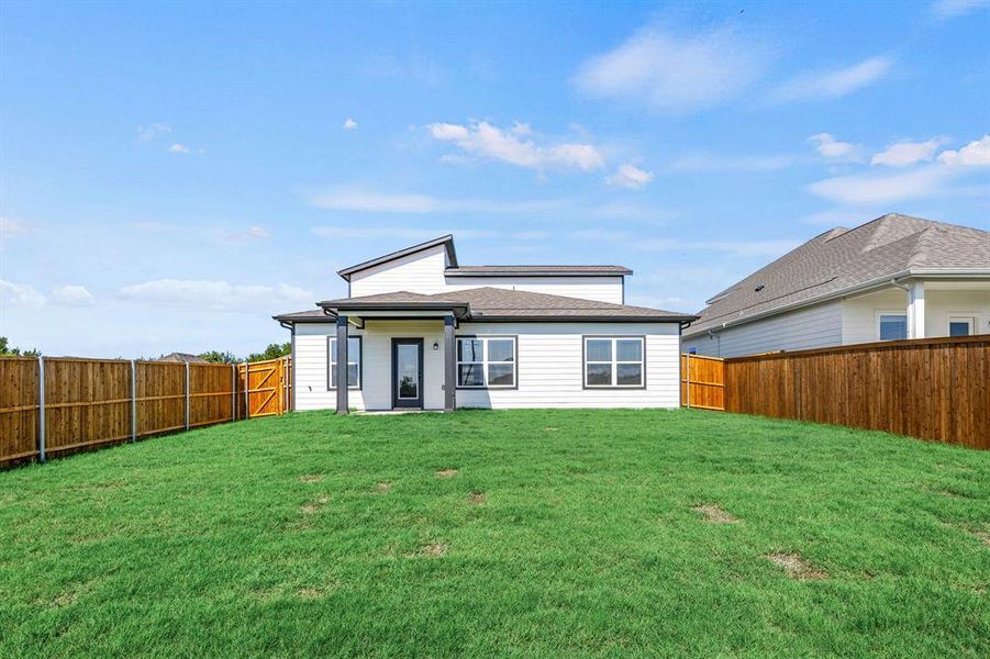 Front exterior of a new home in Kings Way, Denton, TX, highlighting curb appeal (Image 18).