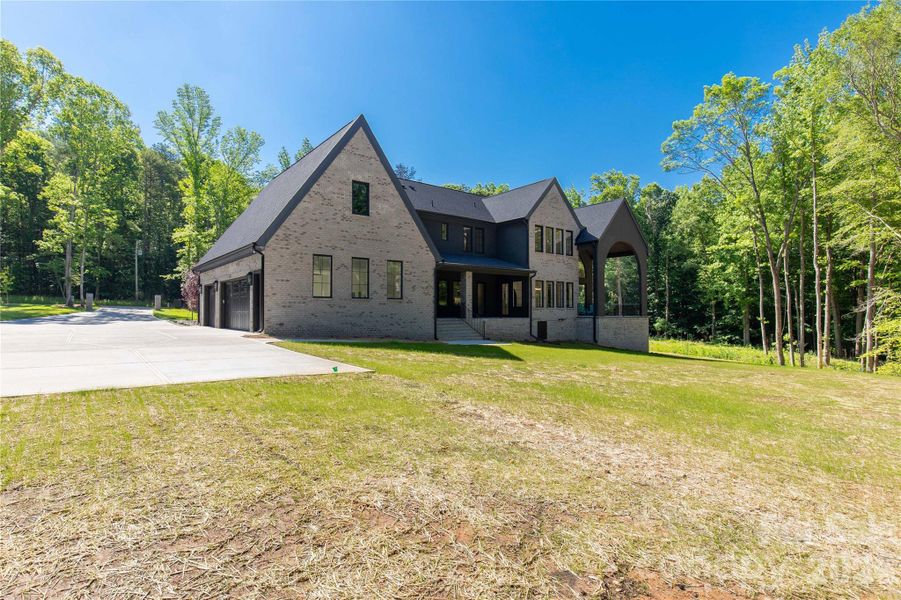Front exterior of a new home in , Indian Land, SC, highlighting curb appeal (Image 28).