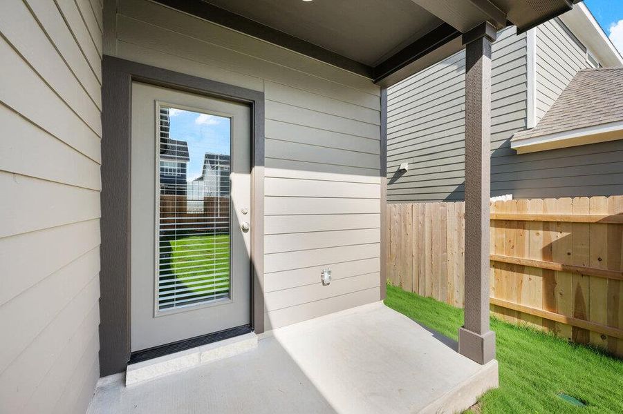 Exterior details and patio area of a home in Lariat, Liberty Hill (Image 20).