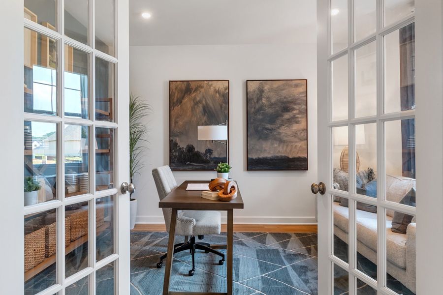 A room with a table and chairs. A room with a table and chairs.