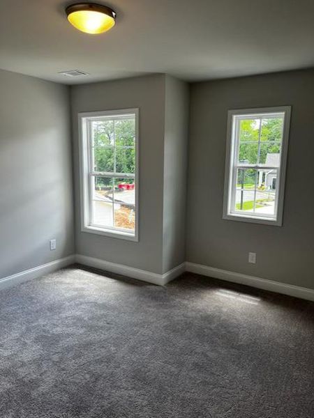 Spacious, unfurnished interior of a new home in Riversong, Duluth (Image 15).