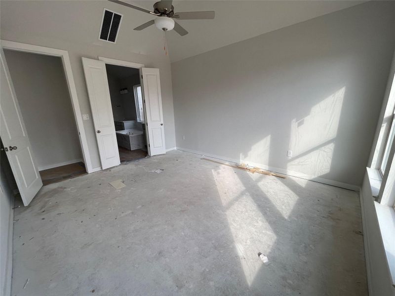 Primary Bedroom with elevated ceiling