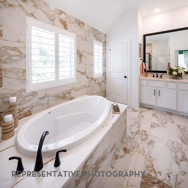 Furnished interior view inside a new home in Bridgeland, Cypress (Image 26).