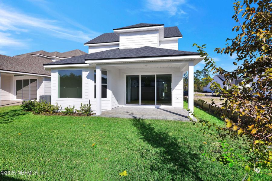 Exterior details and patio area of a home in Seabrook Village at Seabrook, Ponte Vedra (Image 25).