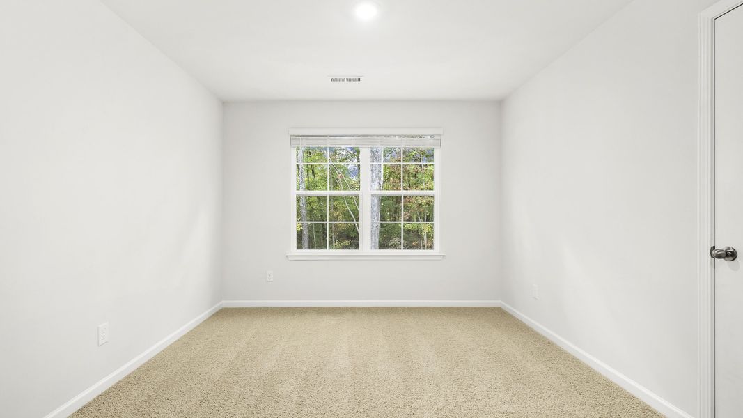 Spacious, unfurnished interior of a new home in Greystone North, Stoneville (Image 14).