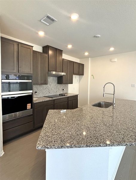 Furnished interior view inside a new home in Retreat at San Gabriel, Georgetown (Image 14).