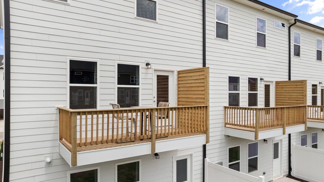 Exterior details and patio area of a home in Everton, Durham (Image 3).