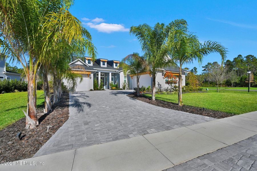 Exterior details and patio area of a home in Palmetto Cove, Ponte Vedra (Image 25).