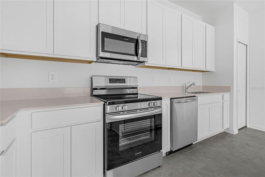 Furnished interior view inside a new home in , Davenport (Image 9).