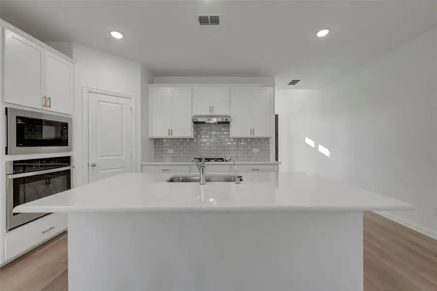 Furnished interior view inside a new home in Lily Creek at Sutton Fields, Aubrey (Image 6).