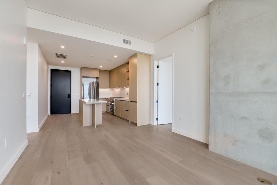 Photos shown are of the same floor plan three floors higher.