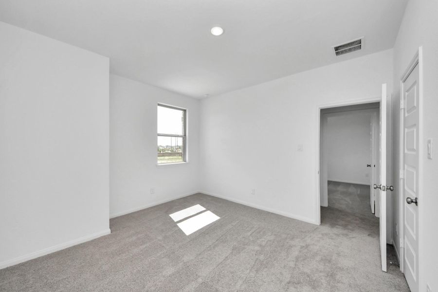 Spacious, unfurnished interior of a new home in 50' Traditional Homes at Elyson, Katy (Image 15).