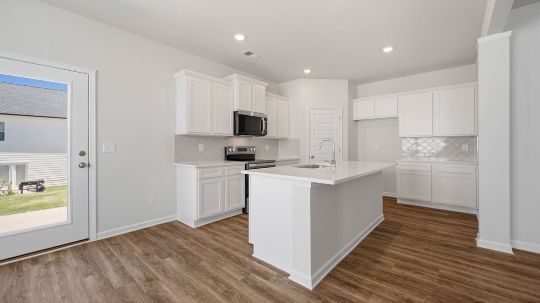 Furnished interior view inside a new home in Shoal Creek, Hampton (Image 3).