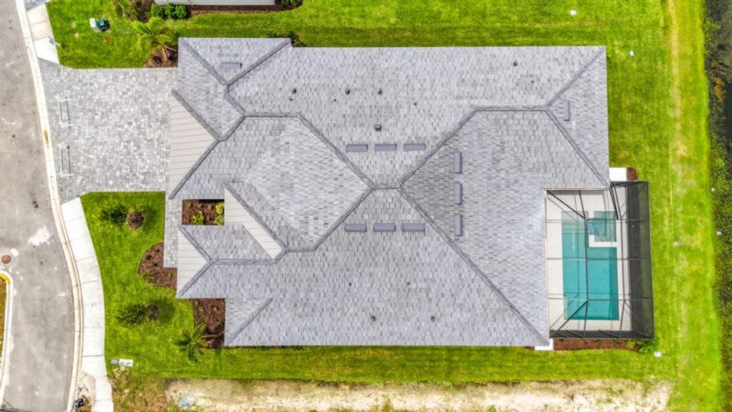 Exterior details and patio area of a home in River Preserve Estates, Parrish (Image 32).