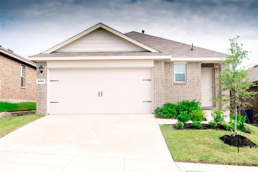 Single story home with a shingled roof, brick siding, driveway, a front lawn, and a garage Single story home with a shingled roof, brick siding, driveway, a front lawn, and a garage