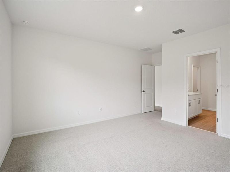 Spacious, unfurnished interior of a new home in The Grove at Stuart Crossing - Classic Series, Bartow (Image 12). Spacious, unfurnished interior of a new home in The Grove at Stuart Crossing - Classic Series, Bartow (Image 12).