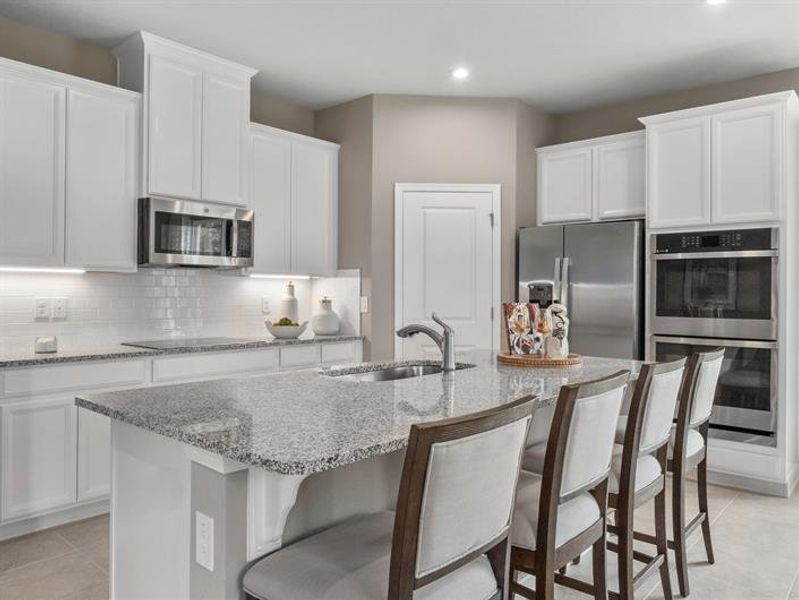 Representative furnished interior of a home built from the Glen Ridge by Ryan Homes in Cypress Ridge Ranch, Wimauma (Image 2).