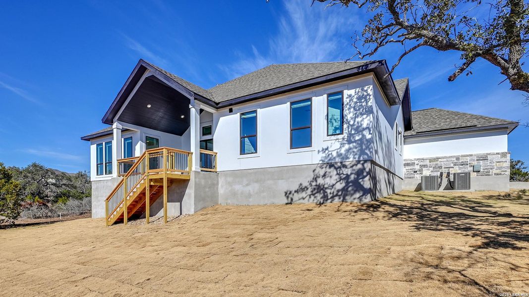 Exterior details and patio area of a home in Johnson Ranch, Bulverde (Image 3).
