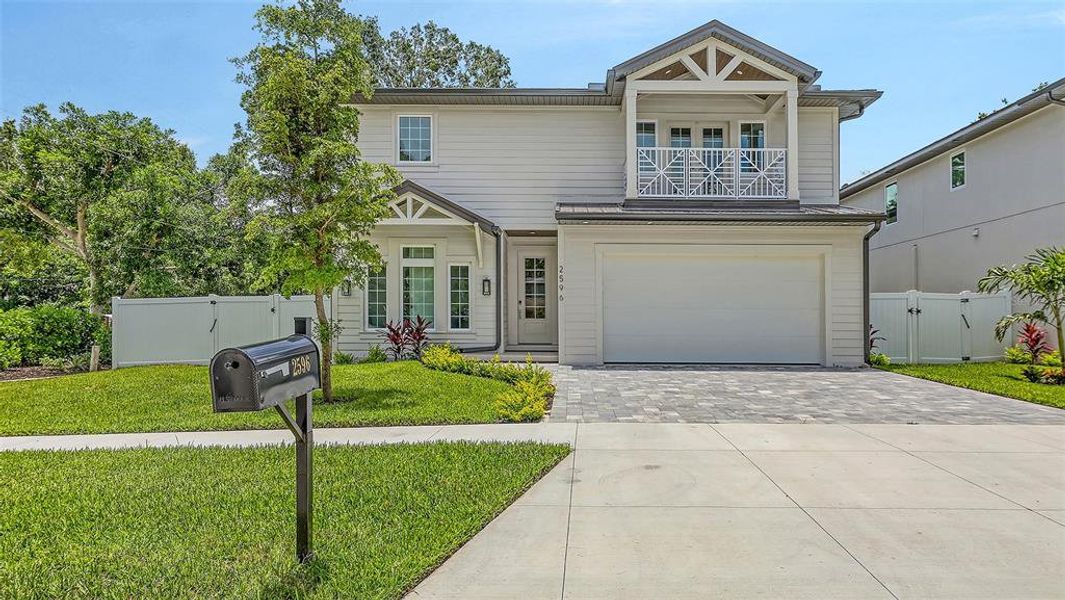 Front exterior of a new home in , Sarasota, FL, highlighting curb appeal (Image 2).