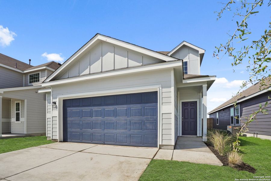 Front exterior of a new home in Dauer Ranch, New Braunfels, TX, highlighting curb appeal (Image 17). Front exterior of a new home in Dauer Ranch, New Braunfels, TX, highlighting curb appeal (Image 17).