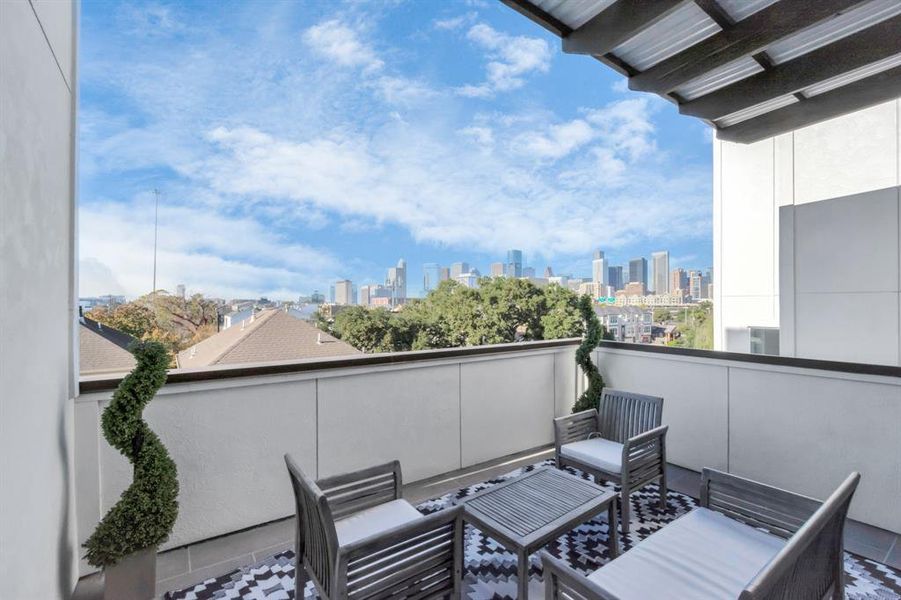 Roof top deck view of downtown skyline. Can also build a custom outdoor kitchen.