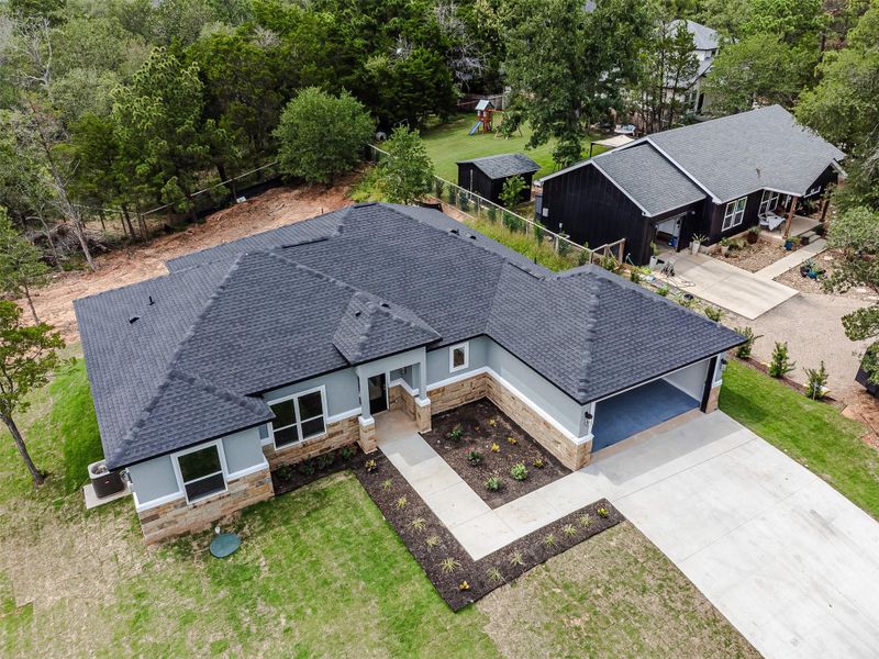 A new construction home with an attached garage, offering modern living. A new construction home with an attached garage, offering modern living.