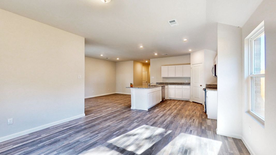 A large empty living room. A large empty living room.