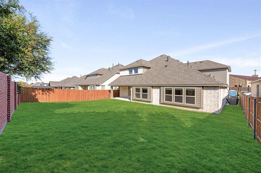 Exterior details and patio area of a home in The Enclave at Parks of Aledo, Aledo (Image 1). Exterior details and patio area of a home in The Enclave at Parks of Aledo, Aledo (Image 1).