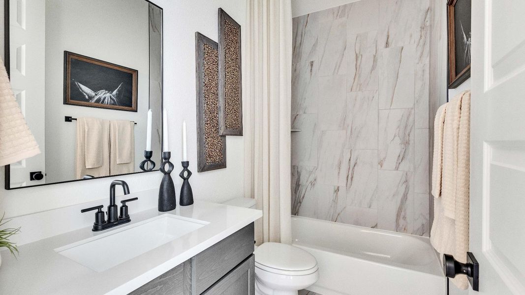 Model home photos of similar floorplans, not pictures of actual home.