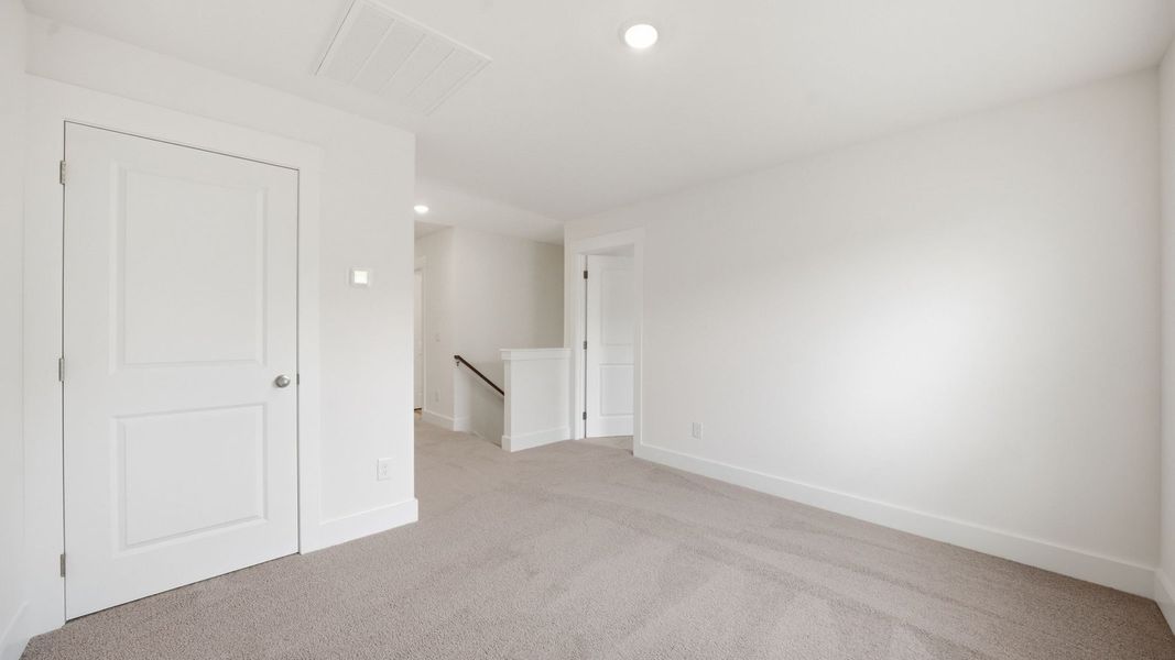 Spacious, unfurnished interior of a new home in The Hideaway at Fox Meadows, Bluff City (Image 24).
