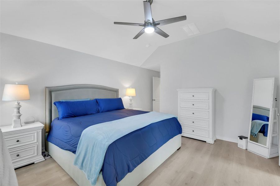 Primary Bedroom: High Ceilings, Wood Floor, Ceiling Fan, Plantation Shutters