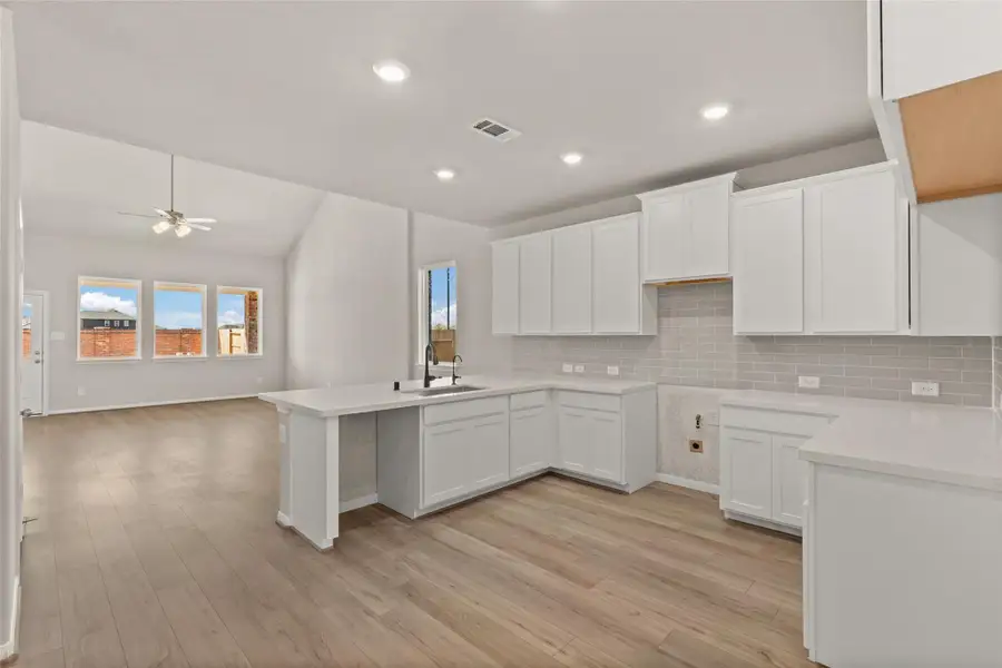 Furnished interior view inside a new home in Spring Creek Trails, Magnolia (Image 3).