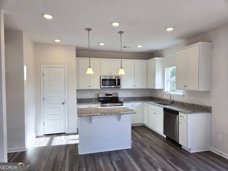 Furnished interior view inside a new home in Maddox Station, Eatonton (Image 3).