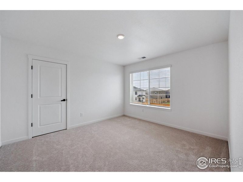 Spacious, unfurnished interior of a new home in Hansen Farm, Fort Collins (Image 23).