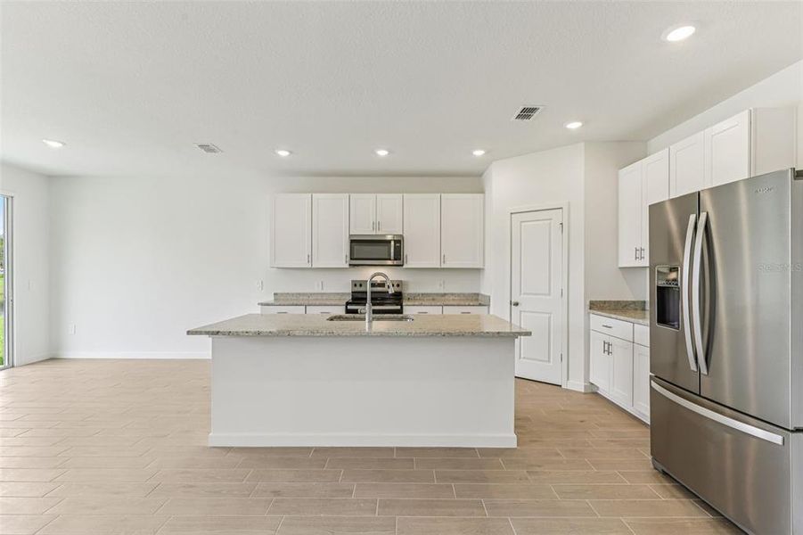 Furnished interior view inside a new home in Colbert Landings, Palm Coast (Image 5).