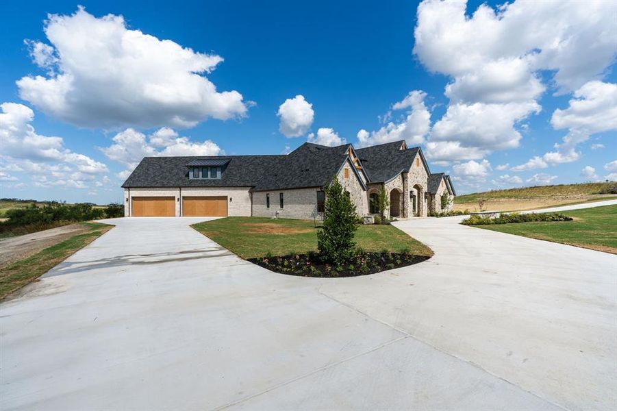 Front exterior of a new home in , Aledo, TX, highlighting curb appeal (Image 21). Front exterior of a new home in , Aledo, TX, highlighting curb appeal (Image 21).