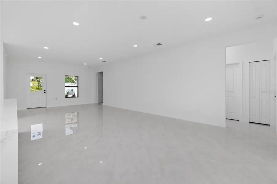 Spacious, unfurnished interior of a new home in , Port Charlotte (Image 62).