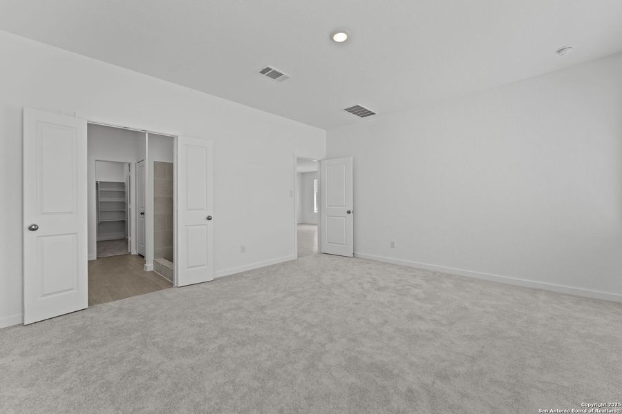 Spacious, unfurnished interior of a new home in Waterwheel: Coastline Collection, San Antonio (Image 22).
