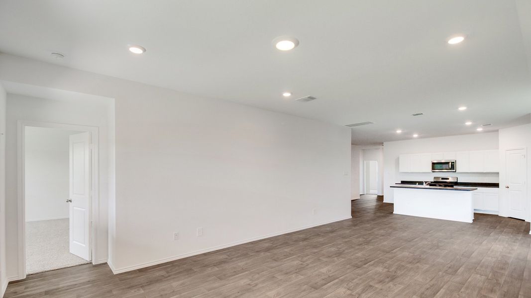 Representative unfurnished interior of a home built from the The Gaven by D.R. Horton in Wayside, Uhland (Image 10).