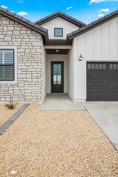 Representative exterior details of a home built from the Pebble Beach- II by LEH. Homes in Verdancia, El Paso (Image 3).