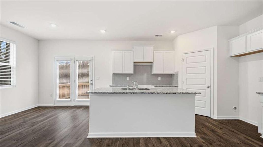 Furnished interior view inside a new home in Inverness at Sugarloaf, Lawrenceville (Image 8).