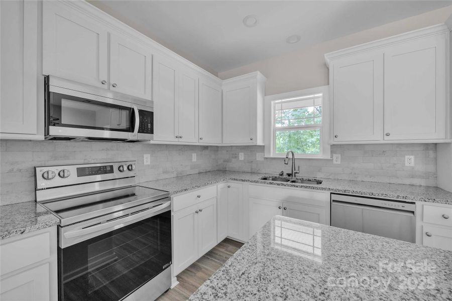 Furnished interior view inside a new home in , Mocksville (Image 6).
