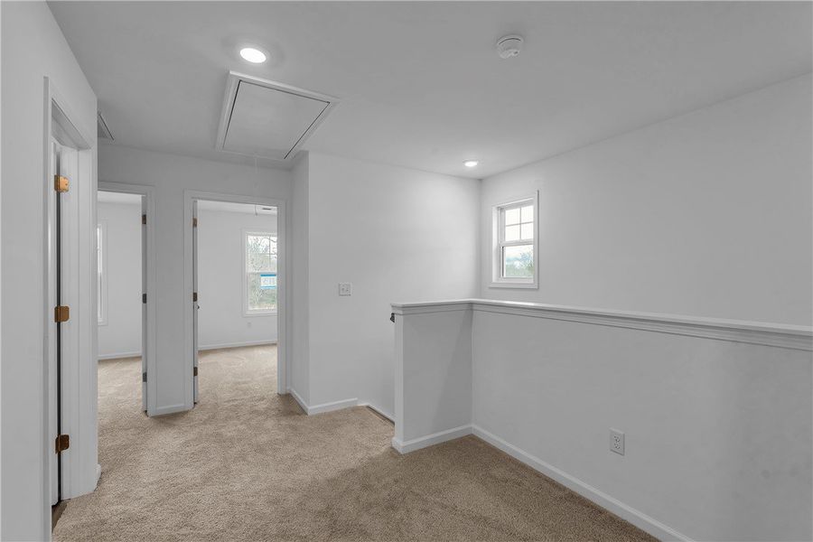 This bright and airy interior space features soft This bright and airy interior space features soft