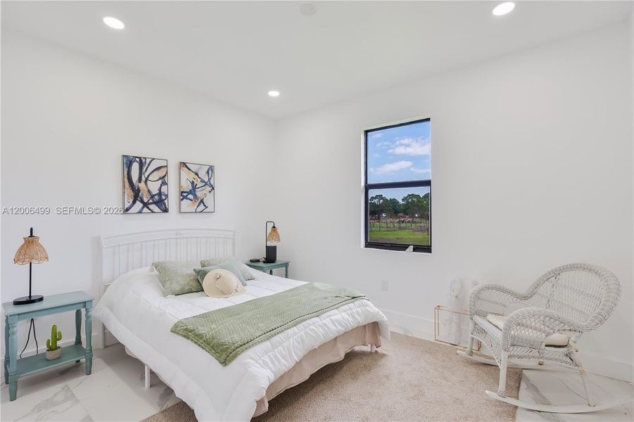 Furnished interior view inside a new home in , Clewiston (Image 26).