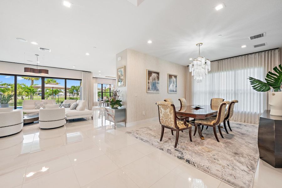 Formal dining room near the foyer, kitchen, and great room.